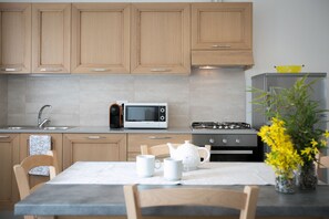 Apartment, 2 Bedrooms, Accessible, Garden View | Private kitchen | Full-sized fridge, stovetop, espresso maker, coffee/tea maker - Agriturismo Mestroni (Campoformido)