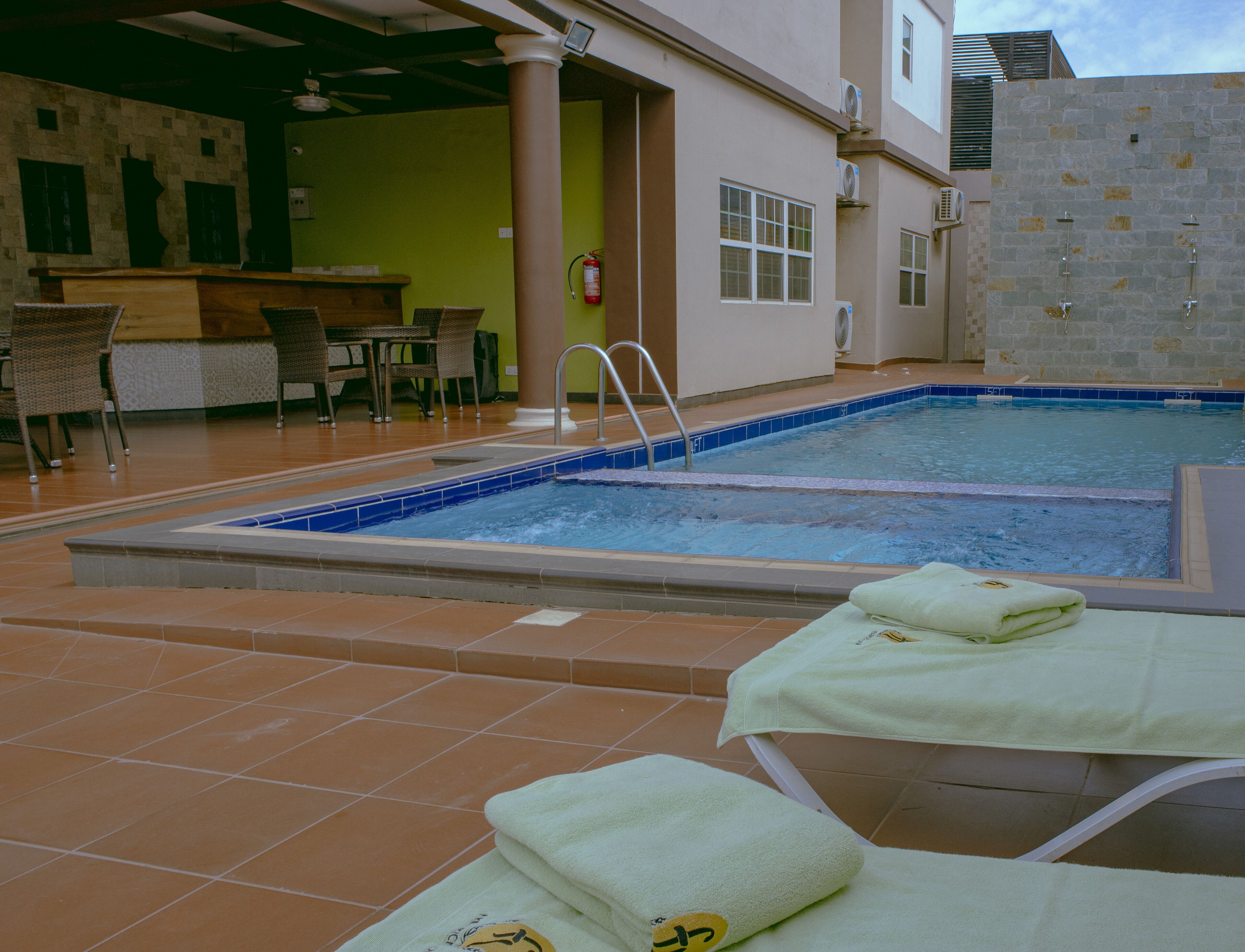 Outdoor pool, open 6 AM to 7 PM, pool umbrellas, sun loungers