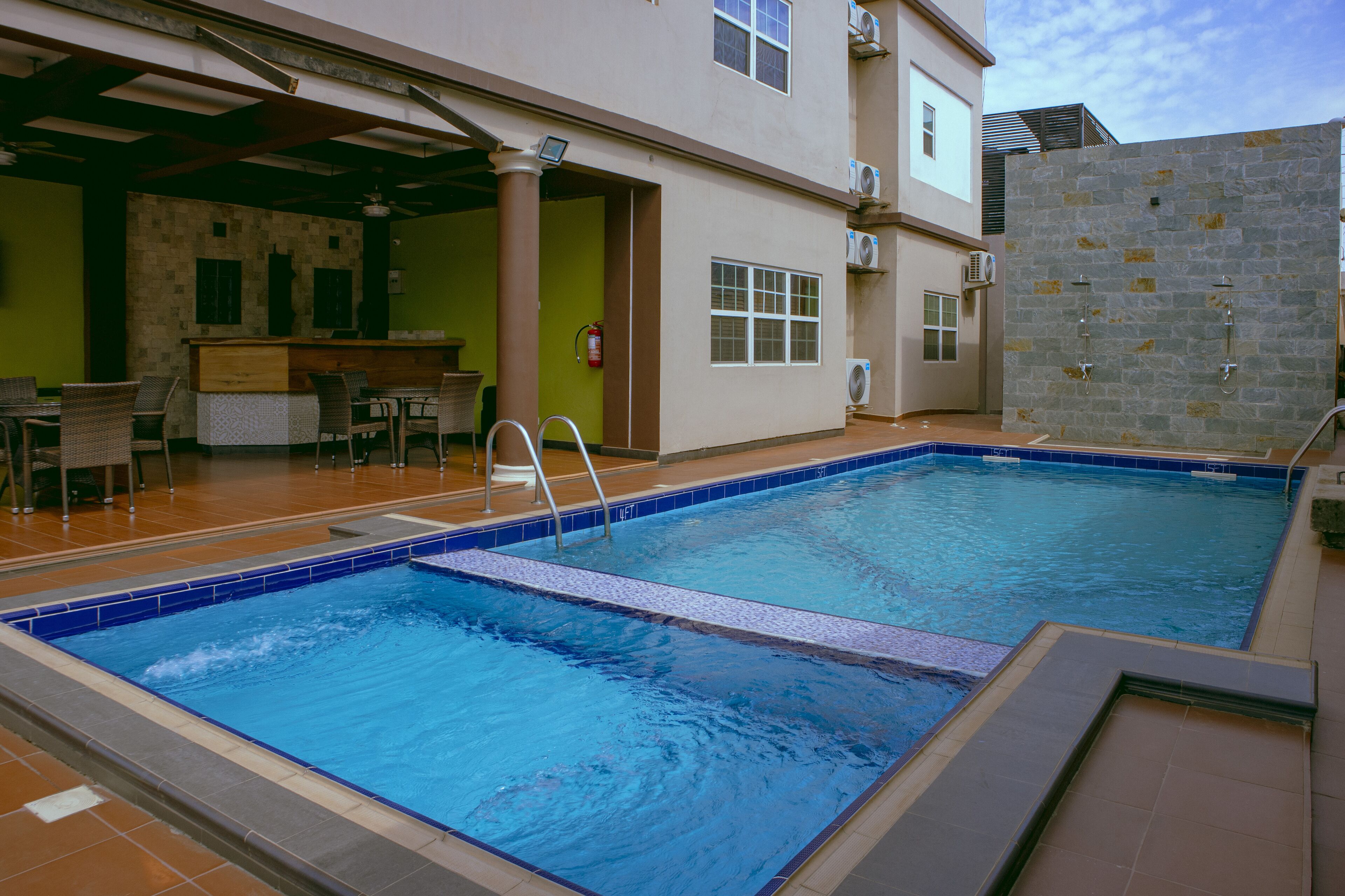 Outdoor pool, open 6 AM to 7 PM, pool umbrellas, sun loungers