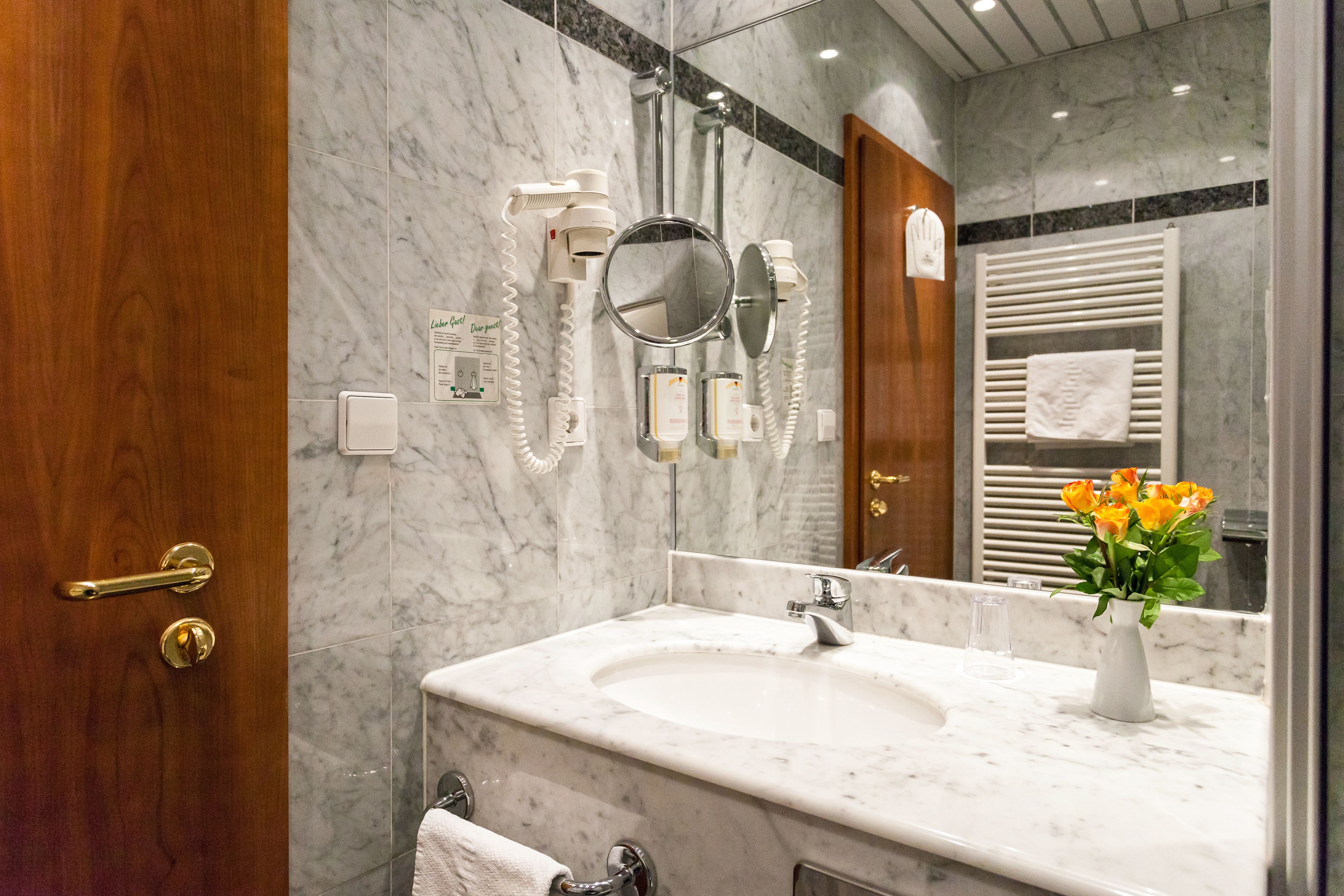 hair dryer, towels, soap, shampoo