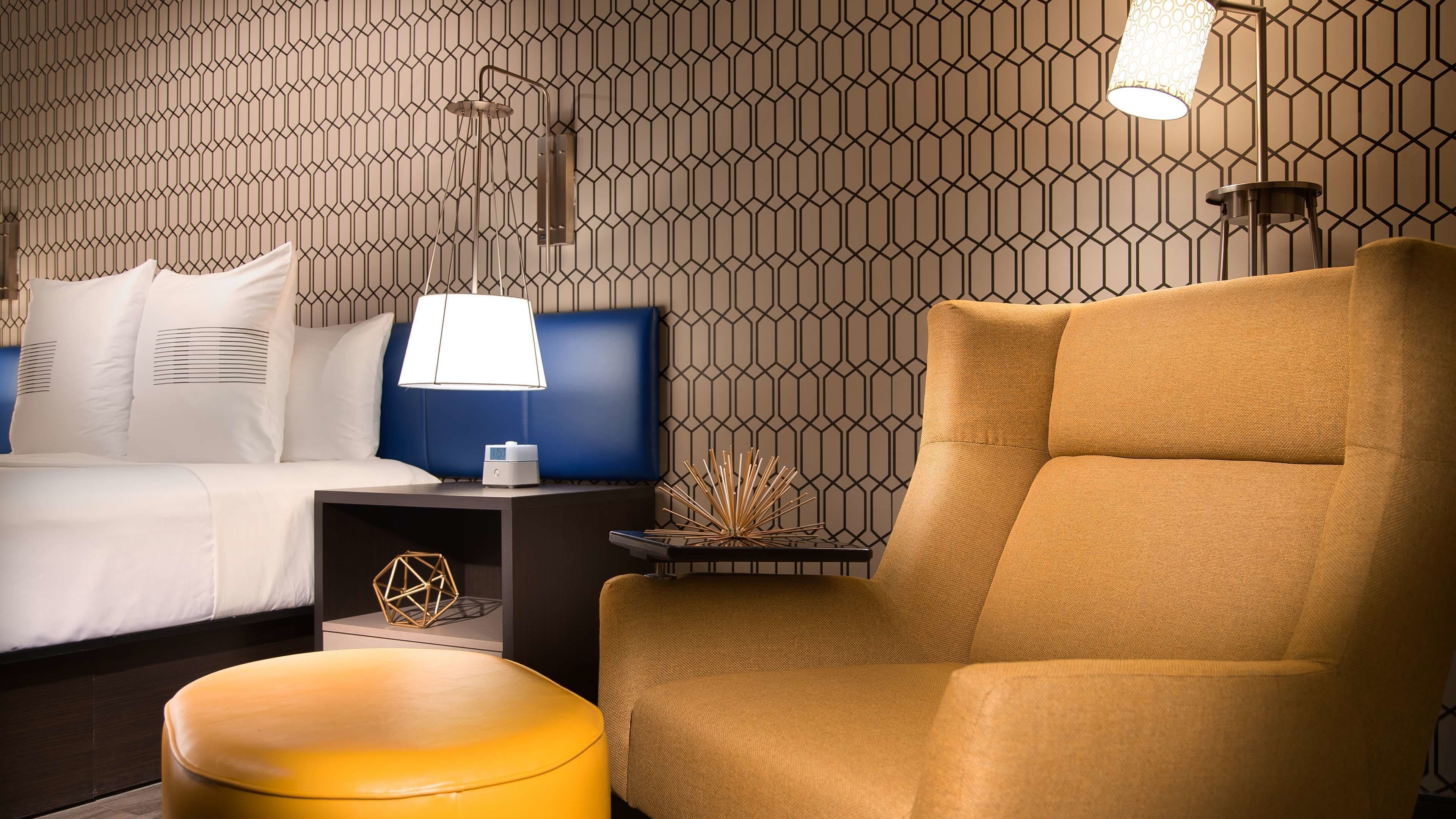 laptop workspace, blackout curtains, iron/ironing board