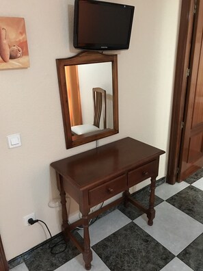 Desk, blackout curtains, free cots/infant beds, rollaway beds