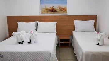 Triple Room | Minibar, desk, iron/ironing board, free WiFi