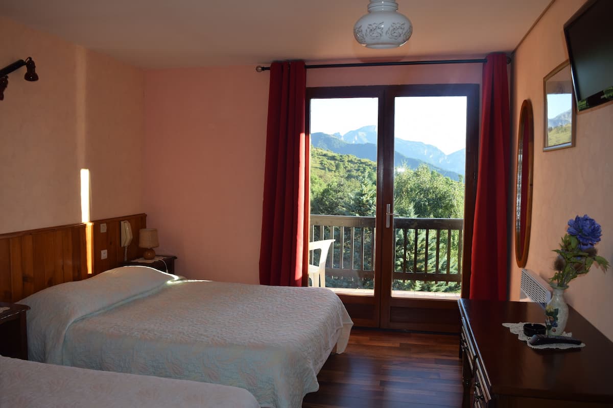 deluxe triple room, non smoking, mountain view | individually decorated, individually furnished, desk, iron/ironing board