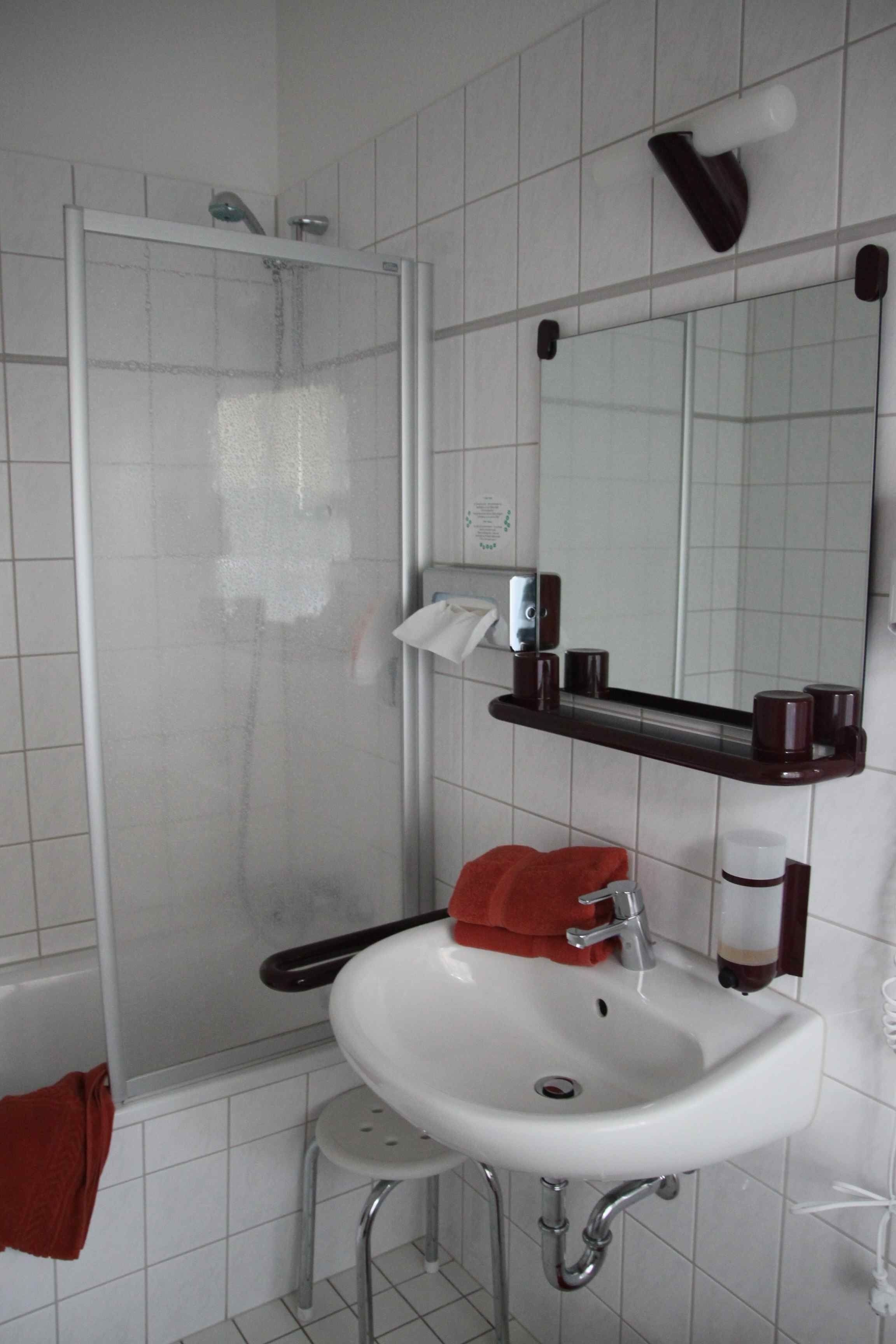 standard double room | bathroom | hair dryer, towels