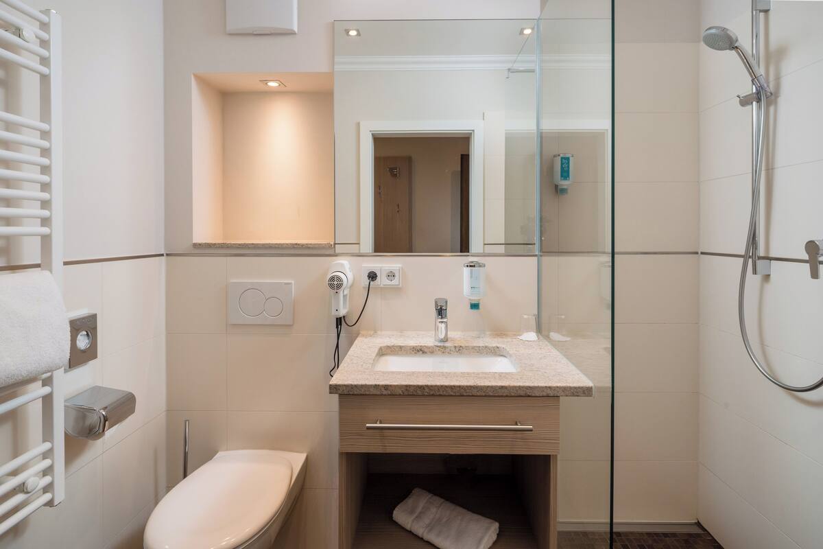 single room | bathroom | hair dryer, towels