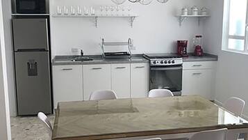 Design Apartment, 1 Queen Bed, Smoking | Private kitchen | Fridge, microwave, stovetop, blender