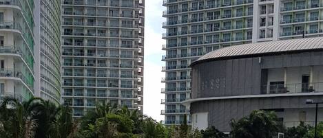 2 outdoor pools, open 7 AM to 7 PM, pool umbrellas