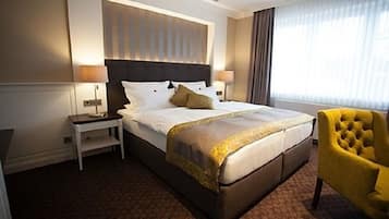 Ropa de cama de alta calidad, minibar y escritorio