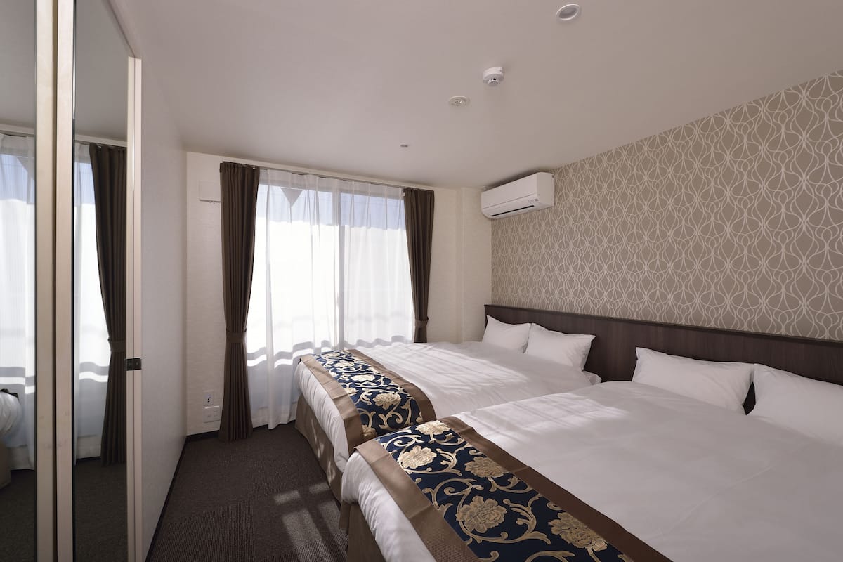Standard Twin Room, 2 Double Beds | Premium bedding, down comforters, desk, blackout drapes