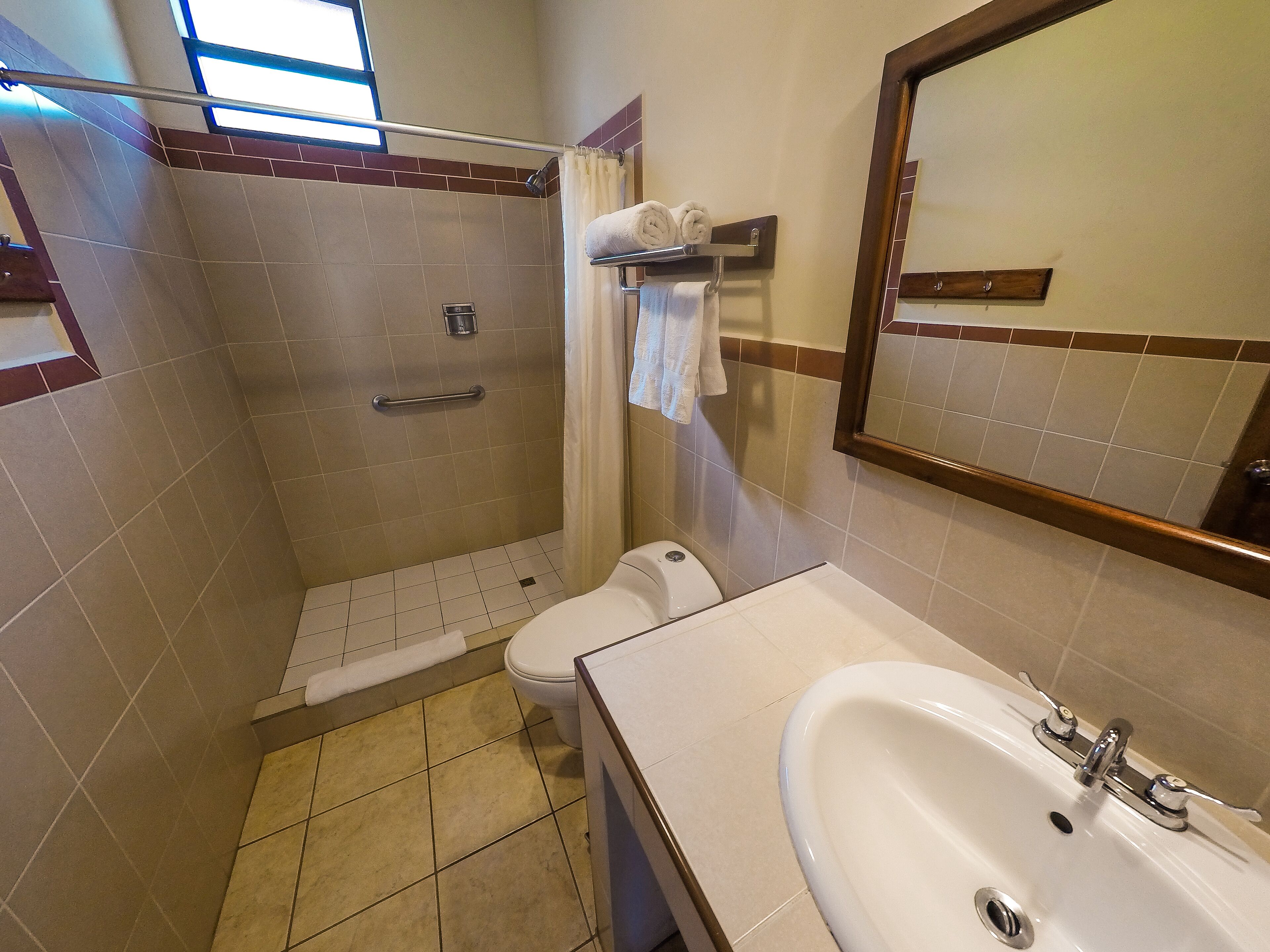 classic twin room | bathroom | shower, free toiletries, hair dryer, towels