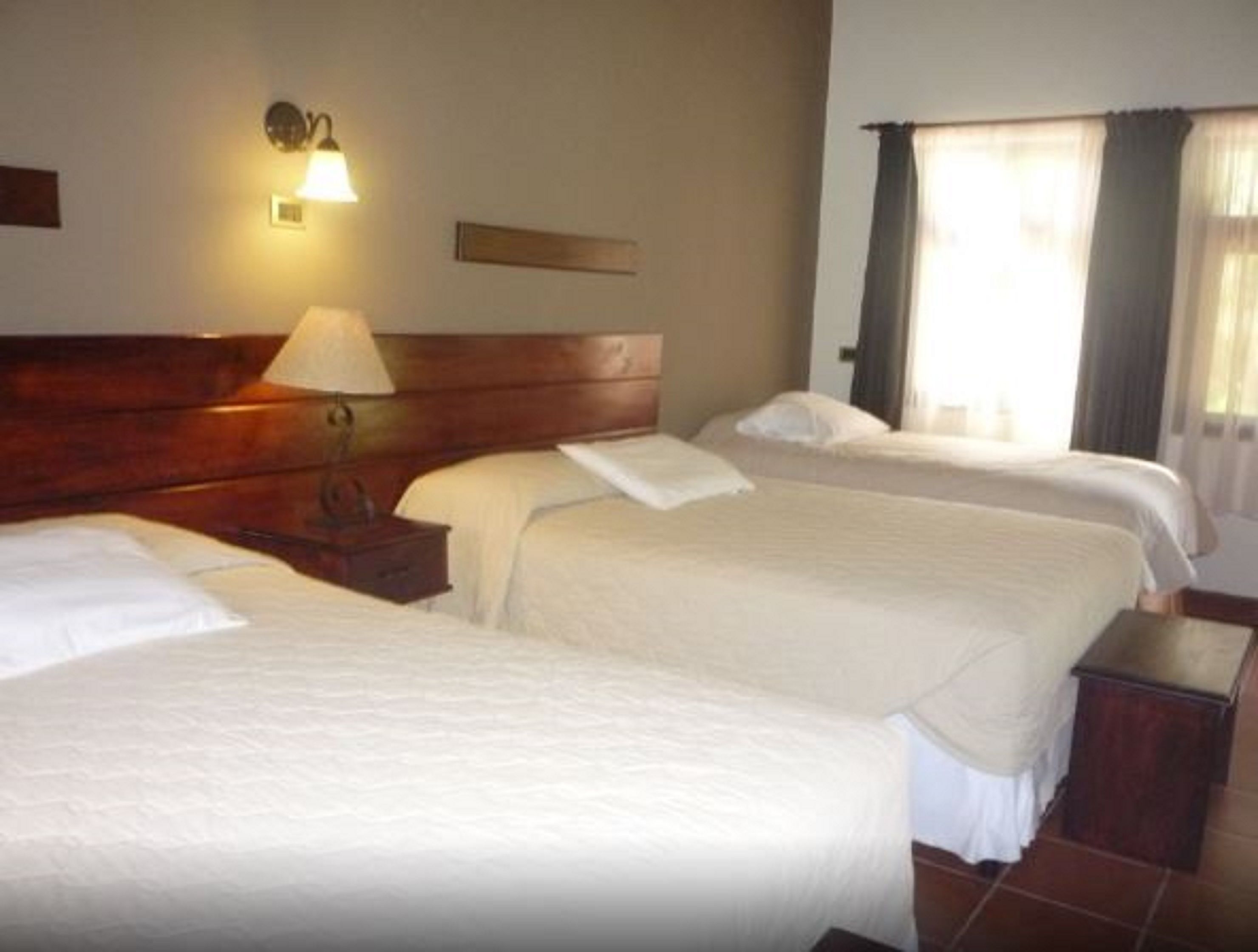 family triple room, multiple beds, non smoking, garden view | desk, free wifi, bed sheets