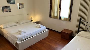 Triple Room, Courtyard View (Room 03) | Desk, free WiFi, bed sheets