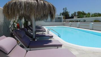 Seasonal outdoor pool, sun loungers