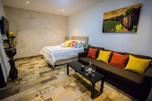Habitación Deluxe, 1 cama Queen size, para no fumadores | Ropa de cama de alta calidad y cortinas blackout