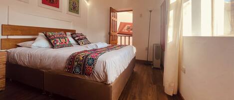 Laptop workspace, free WiFi, bed sheets