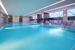 Indoor pool, open 9:00 AM to 9:00 PM, pool loungers - Hyatt Regency Shanghai Jiading (Shanghai)