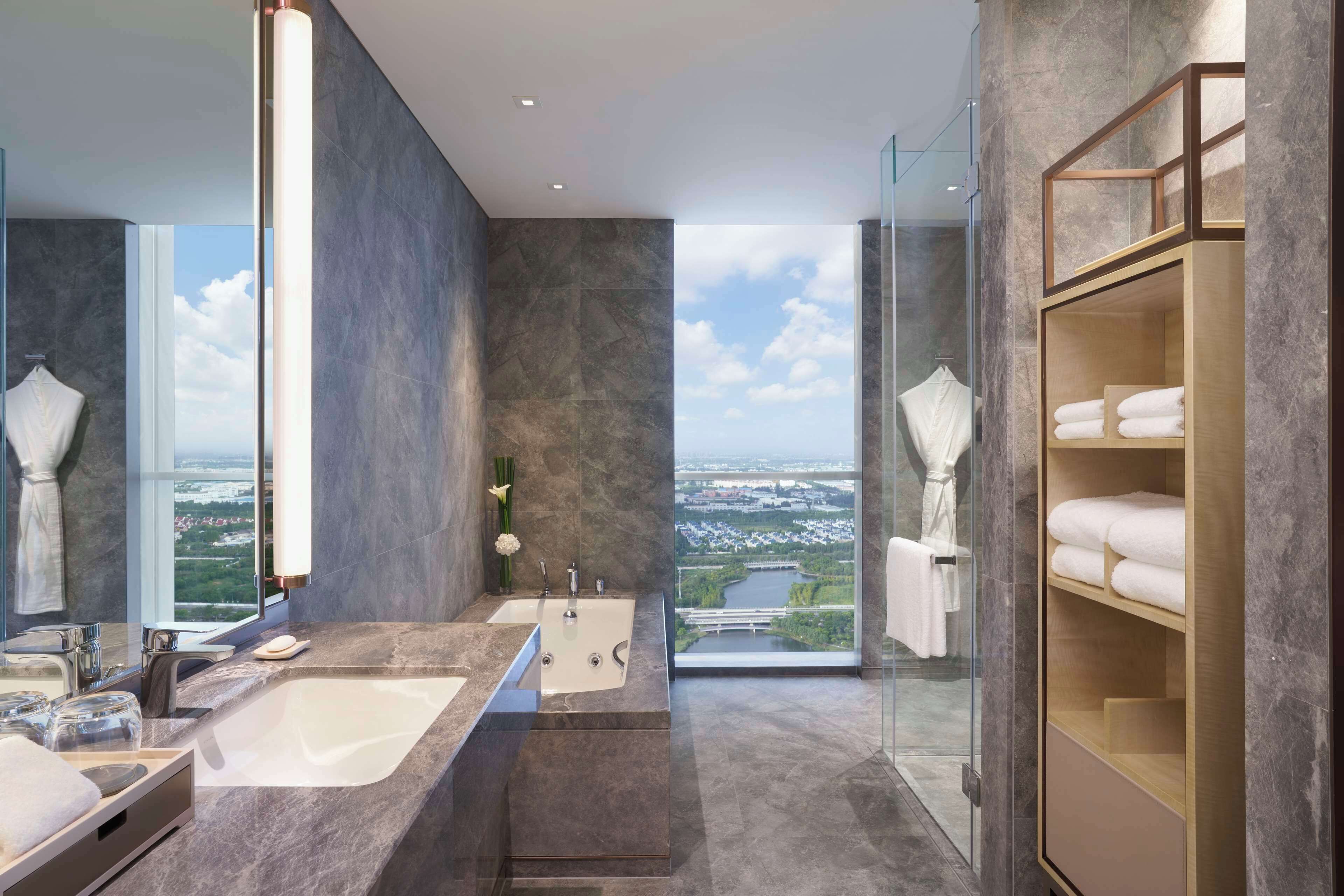 suite (regency) | bathroom | designer toiletries, hair dryer, bathrobes, slippers