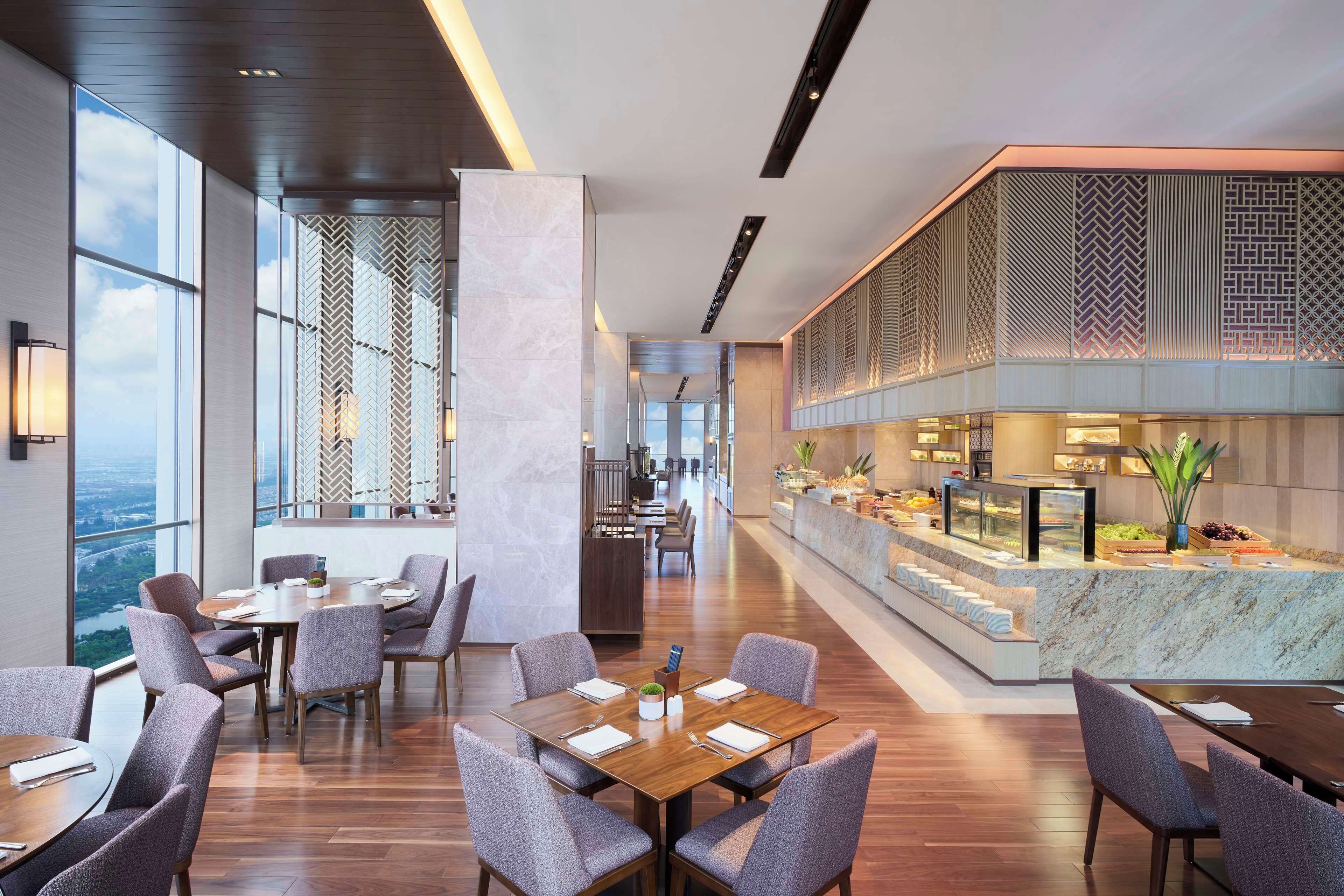 2 restaurants, breakfast, lunch, dinner served; chinese cuisine