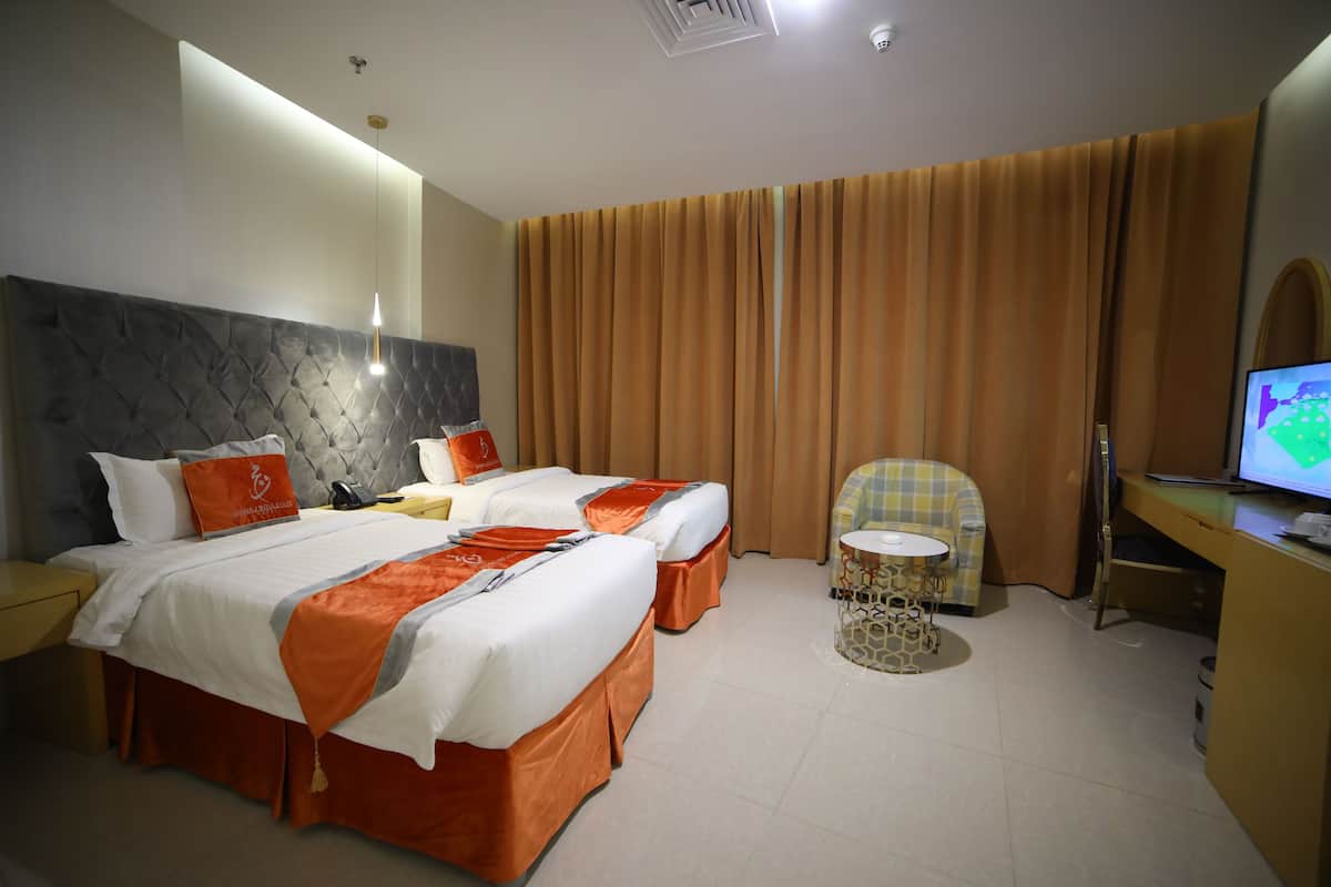 Ropa de cama de alta calidad y minibar