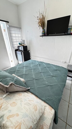 1 dormitorio, tabla de planchar con plancha, wifi gratis y ropa de cama
