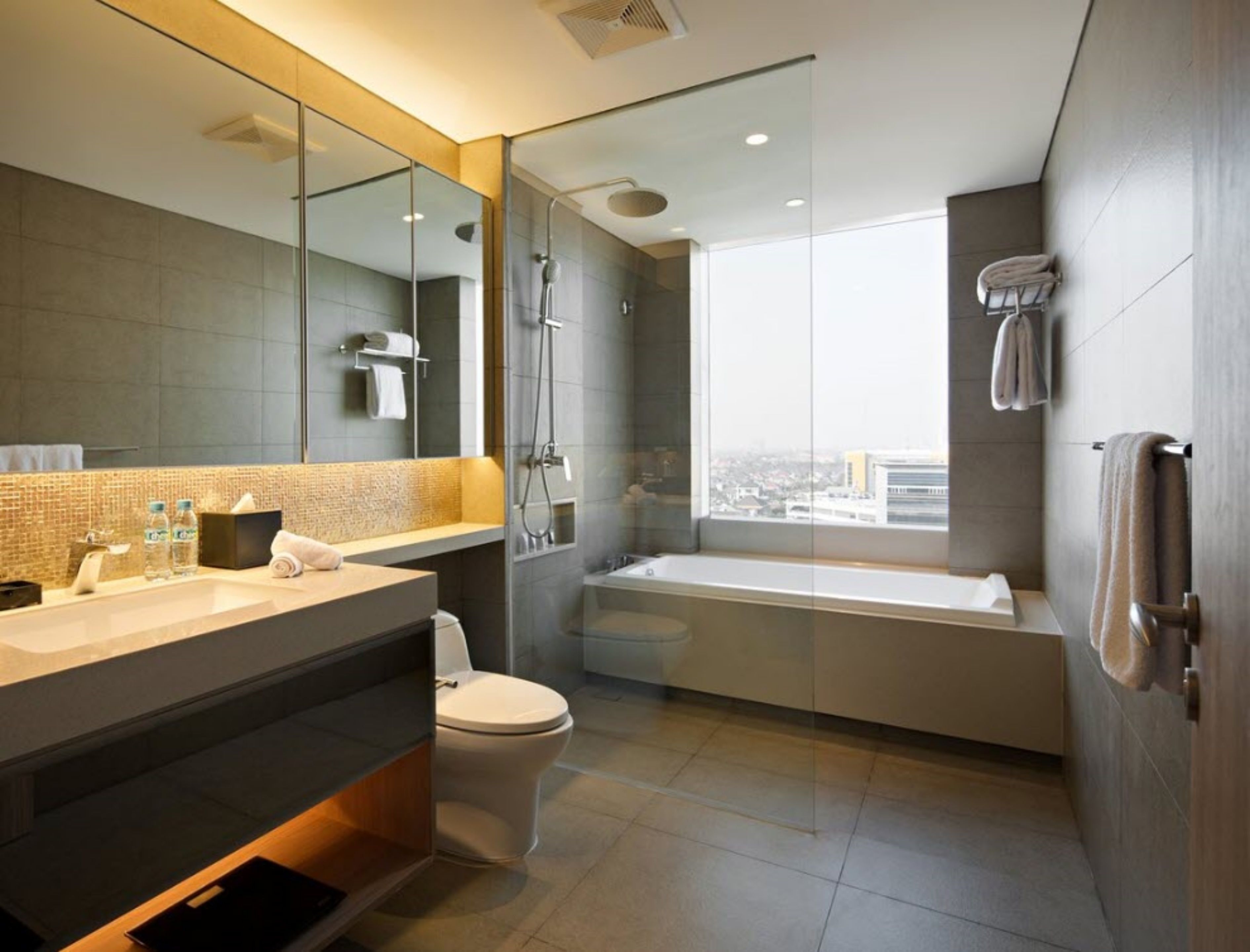 designer toiletries, hair dryer, bathrobes, slippers