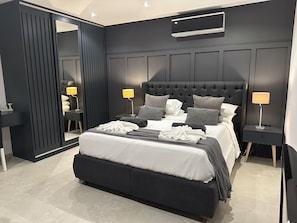 3 chambres, coffres-forts dans les chambres, fer et planche Ă repasser