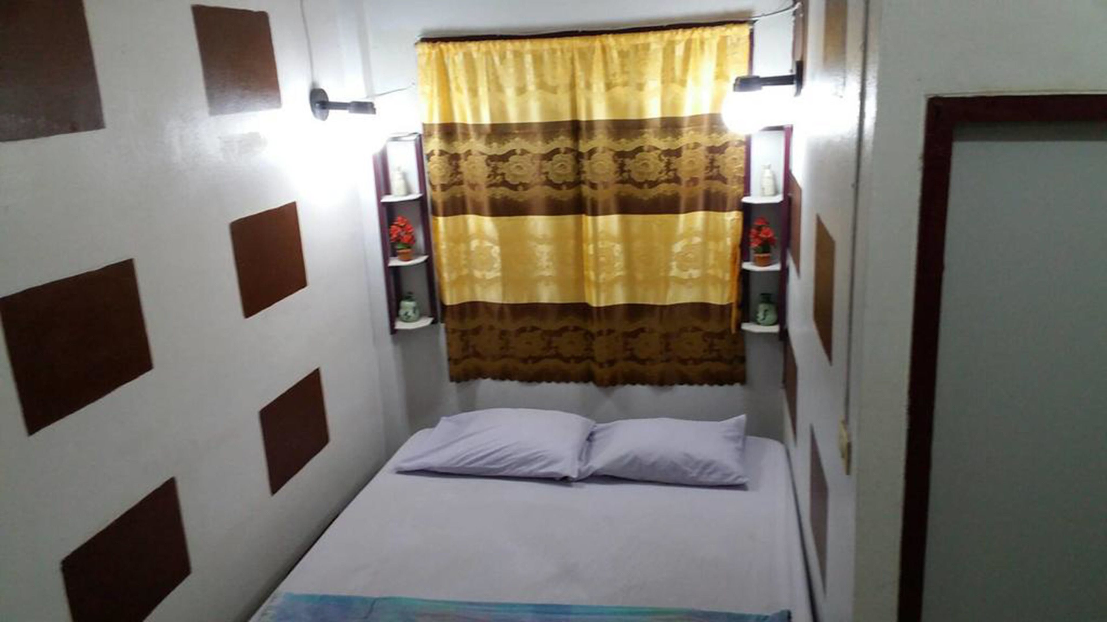 Economy Double room with Fan and Private Bathroom  | Wi-Fi ฟรี, ผ้าปูที่นอน