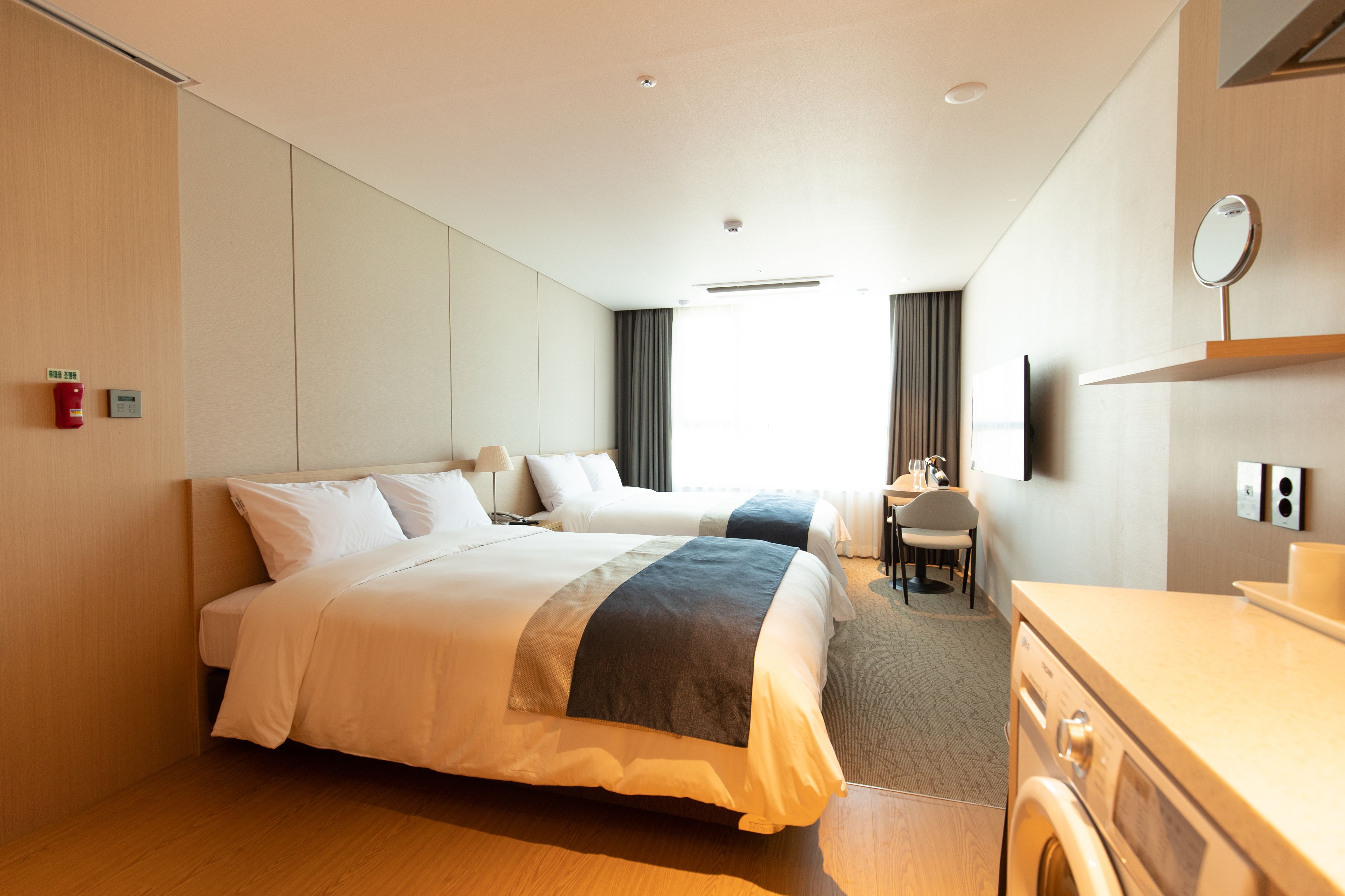 deluxe twin room | down duvets, in-room safe, blackout curtains, soundproofing