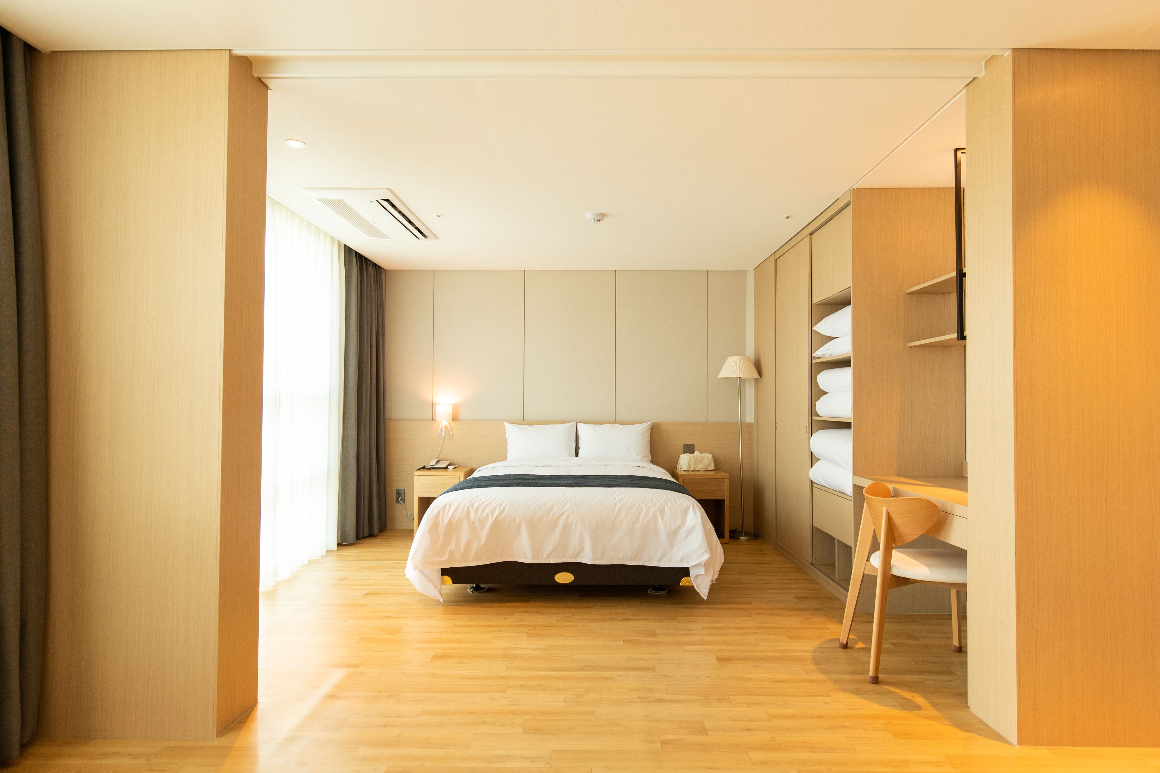 grand family room | down duvets, in-room safe, blackout curtains, soundproofing