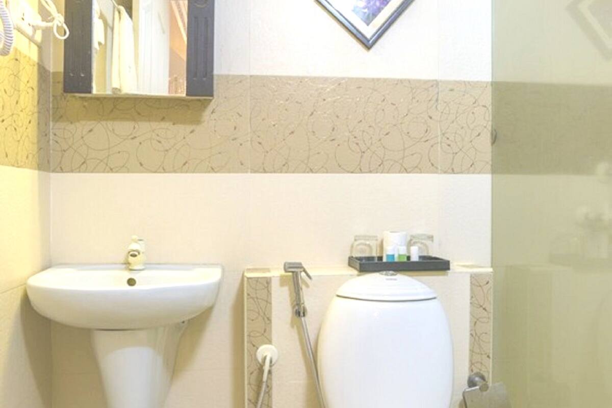 shower, rainfall showerhead, designer toiletries, hair dryer