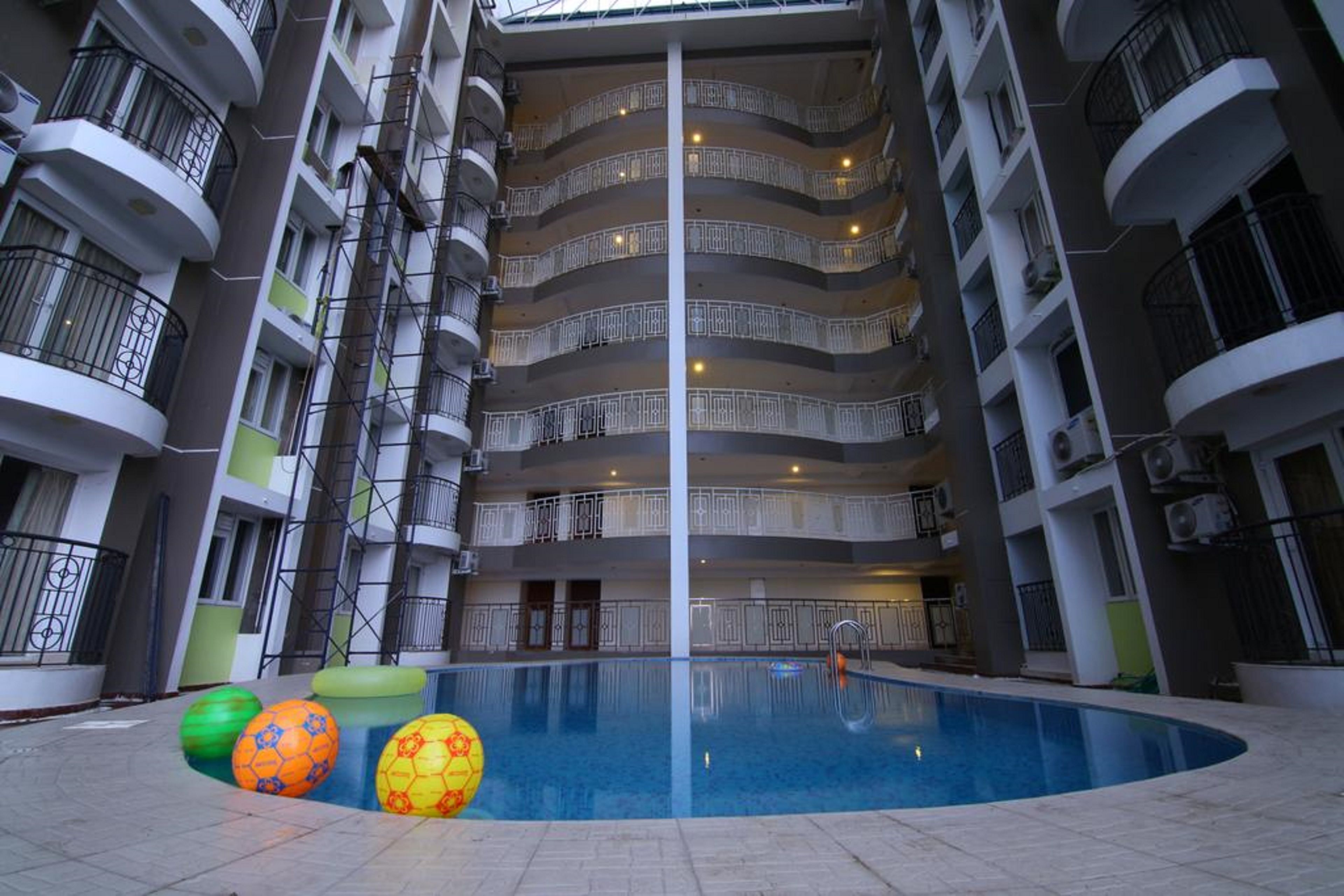 indoor pool, open 7 am to 7 pm, pool umbrellas