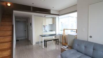 City Studio | Living area | Flat-screen TV