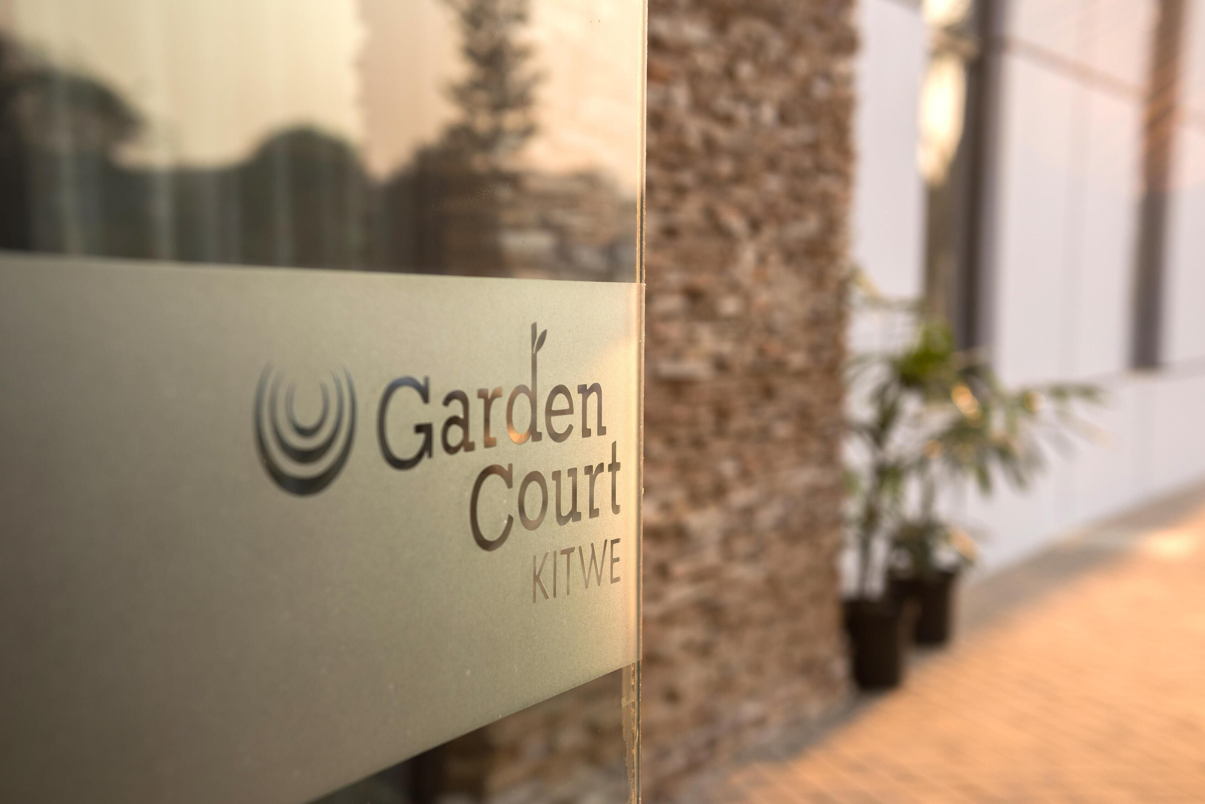 A sign for Garden Court, Kitwe.