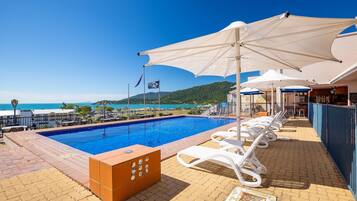 2 outdoor pools, pool umbrellas, pool loungers