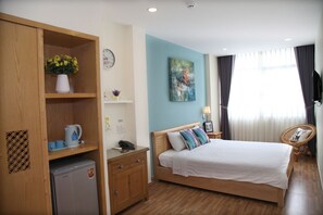 Escritorio, camas supletorias, wifi gratis