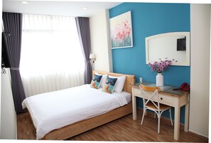 Escritorio, camas supletorias, wifi gratis