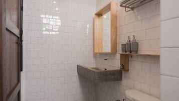 Shower, free toiletries, hair dryer, slippers