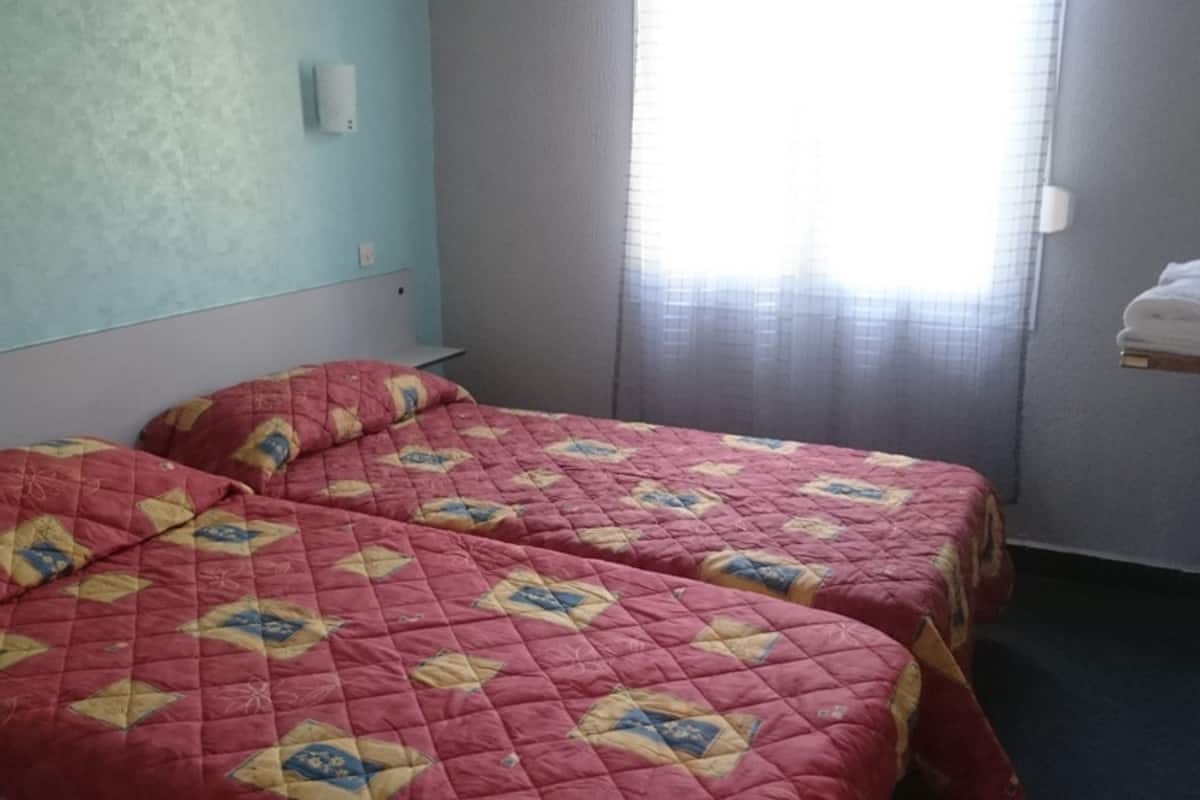 Desk, blackout drapes, soundproofing, iron/ironing board (on request)