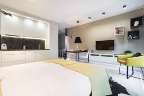 Suite studio Deluxe | Aire de séjour | Téléviseur à écran plat
