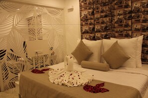 Egyptian cotton sheets, premium bedding, down duvets, memory-foam beds