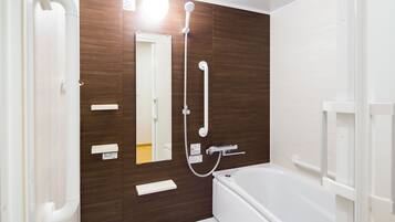 Combined shower/tub, free toiletries, hair dryer, slippers