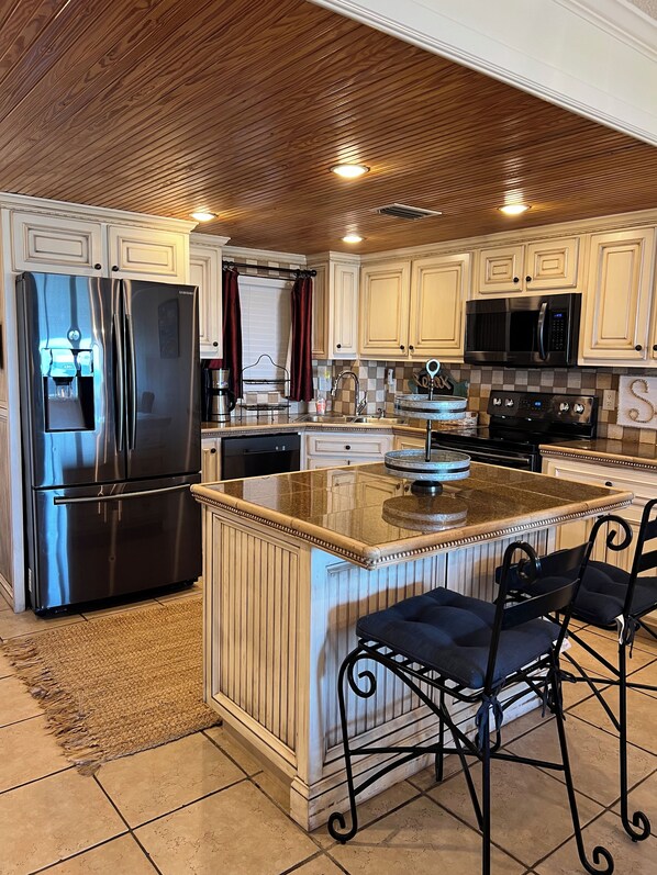 Fridge, microwave, oven, stovetop - 1st Floor Amelia South's Oceanfront Crown Jewel (Fernandina Beach)