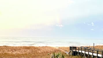 On the beach, sun-loungers, beach towels
