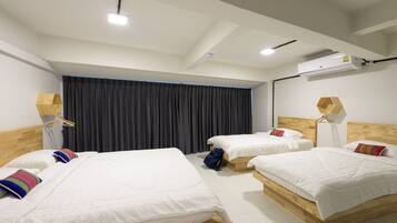 Comfort Quadruple Room | In-room safe, individually decorated, individually furnished