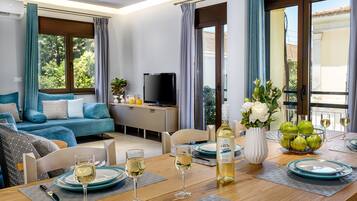 Apartment, 2 Bedrooms | Living area | 32-inch flat-screen TV with satellite channels, TV