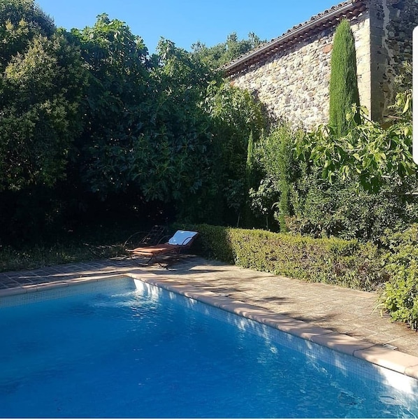 Seasonal outdoor pool, pool loungers