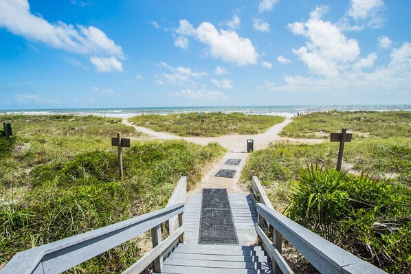 On the beach, sun loungers, beach towels