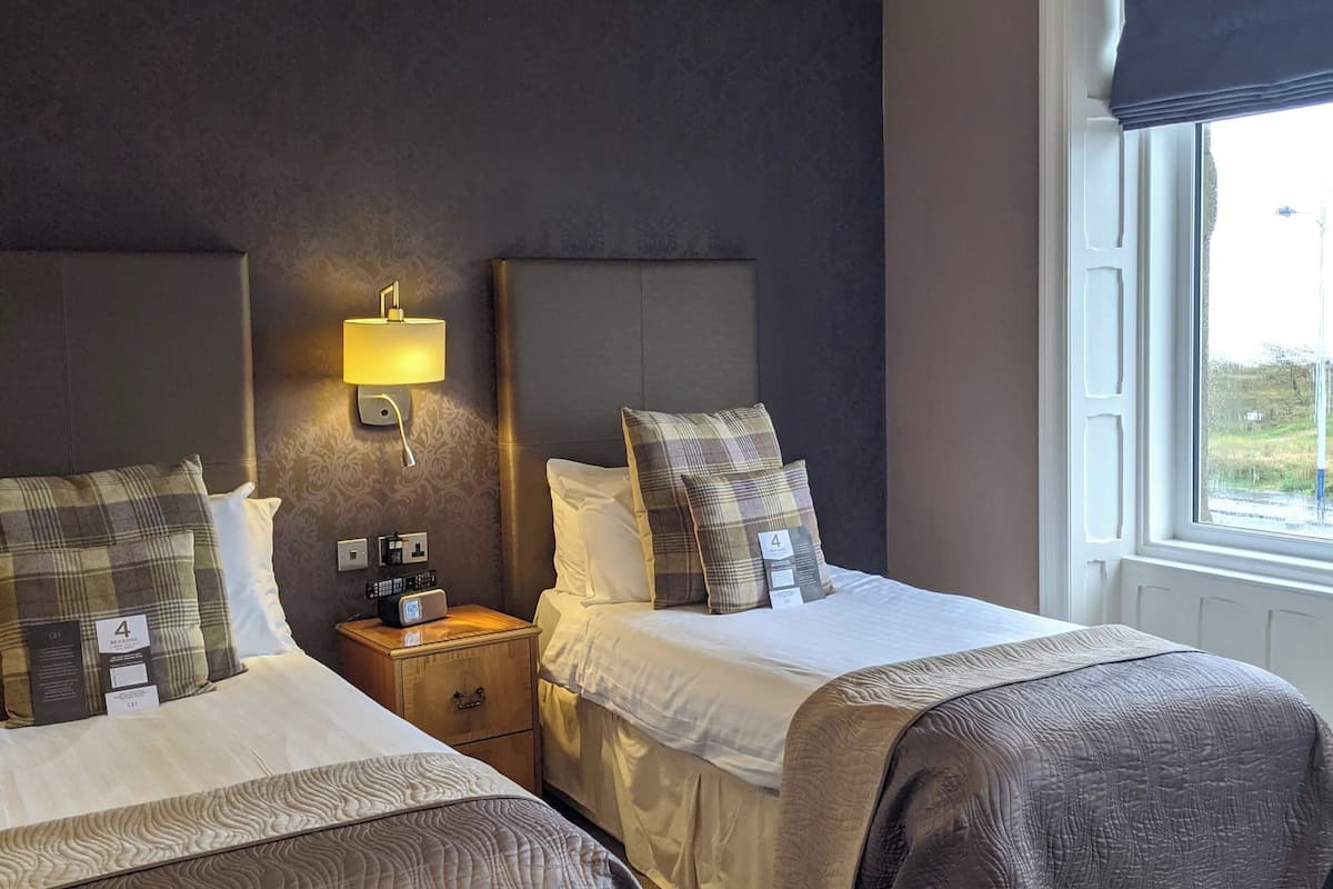 Executive Twin Room, Sea View | Desk, laptop workspace, iron/ironing board, free WiFi