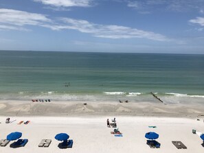 On the beach, sun-loungers, beach towels